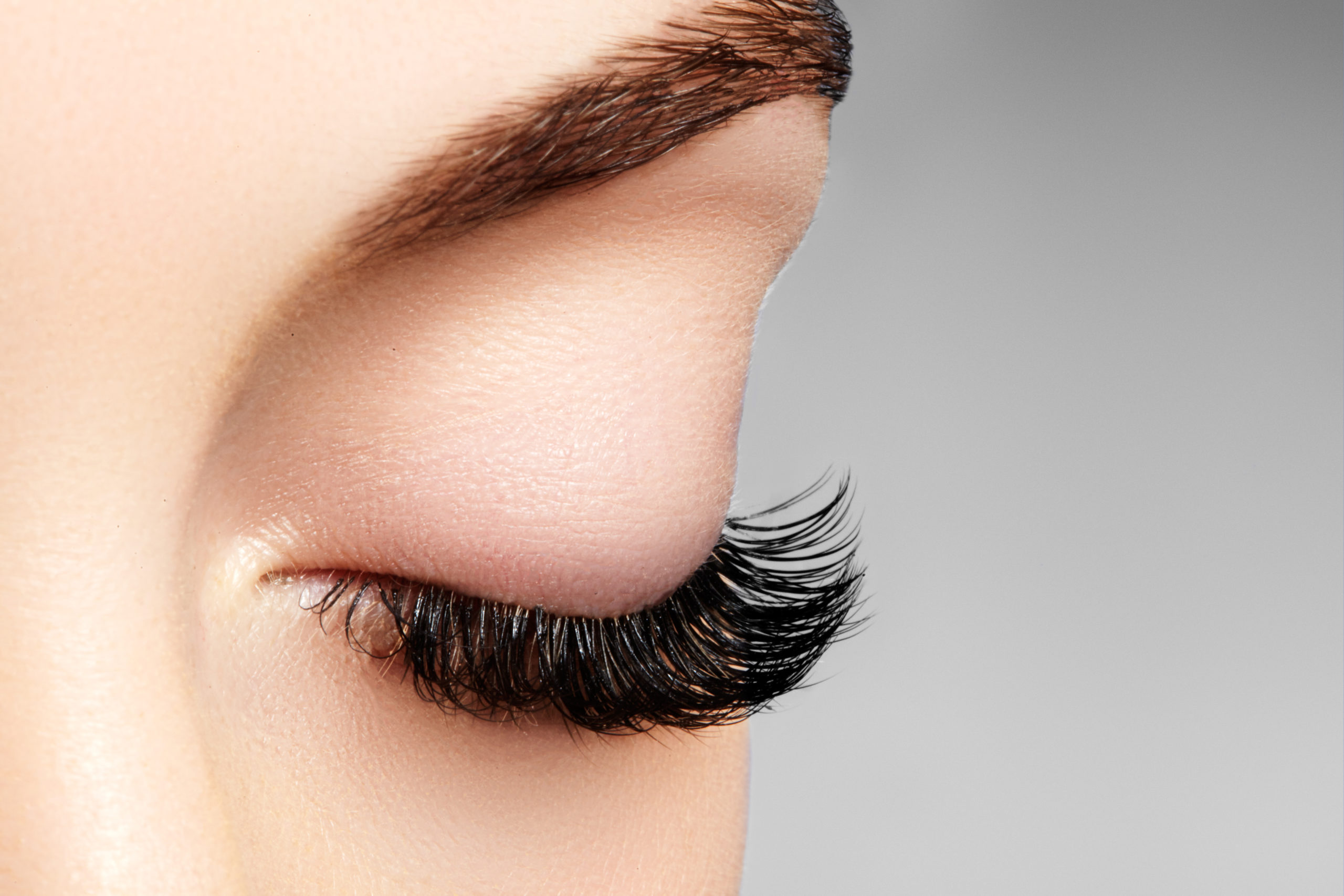 Macro of beautiful eye with extremely long eyelashes