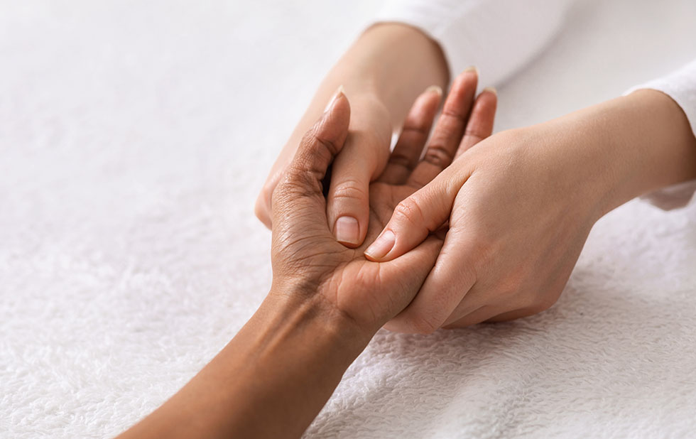 Hand therapy massage for black woman
